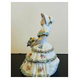 LL - 7-Inch Porcelain Figurine - Woman in Tiered Floral Dress With Bouquet