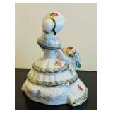 LL - 7-Inch Porcelain Figurine - Woman in Tiered Floral Dress With Bouquet