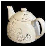DR -Three Vintage Tea Kettles including a Elegance Enamel Teapot, HOMCO Porcelain and Ornate Designed Teapot