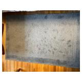 Mid-Century Cross-Leg Ottoman Footstool - Black Leather, 16 in H x 22 in W & Floor Rug