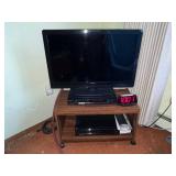 Insignia 32-Inch LCD TV with Sony DVD Player on Wood Stand
