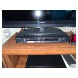 Insignia 32-Inch LCD TV with Sony DVD Player on Wood Stand