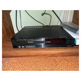 Insignia 32-Inch LCD TV with Sony DVD Player on Wood Stand