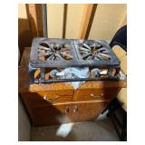 Royal 2-Burner Cast Iron Gas Stove Top - Floral Burner Grates, 4 Folding Chairs, Wooden Cabinet w Contents