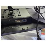 Two Dell E2011Ht monitors on a dual-screen desktop stand; cables are not included.