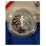 United States Liberty Coins 1986 - Ellis Island Silver Dollar & Statue of Liberty Half Dollar (Lot of 2)