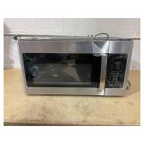 GE 1.6 cu. ft. Over-the-Range Microwave in Stainless Steel Model # JVM3160RF9SS (Minor Transit Damage, See Photos)