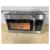 GE 1.6 cu. ft. Over-the-Range Microwave in Stainless Steel Model # JVM3160RF9SS (Minor Transit Damage, See Photos)