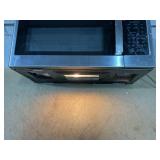 GE 1.6 cu. ft. Over-the-Range Microwave in Stainless Steel Model # JVM3160RF9SS (Minor Transit Damage, See Photos)