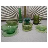 This collection features various vintage green glass items, likely from the Mid-Century Modern (1950s-1970s) or Depression glass (1920s-1940s) eras.