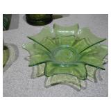 This collection features various vintage green glass items, likely from the Mid-Century Modern (1950s-1970s) or Depression glass (1920s-1940s) eras.