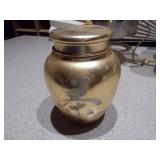 The image displays a collection of vintage enamelware and aluminum kitchen items, primarily used for serving beverages.