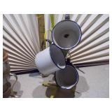 The image displays a collection of vintage enamelware and aluminum kitchen items, primarily used for serving beverages.