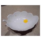 The image displays an assortment of vintage porcelain and pottery collectibles