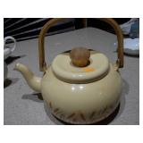 The image displays an assortment of vintage porcelain and pottery collectibles