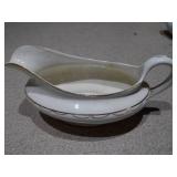 The image displays an assortment of vintage porcelain and pottery collectibles