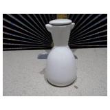 This appears to be a vintage white ceramic oil and vinegar set