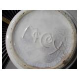 The item pictured is a vintage McCoy pottery cookie jar
