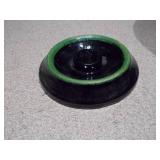 This is a vintage antique McCoy lidded crock cookie jar with a floral design.