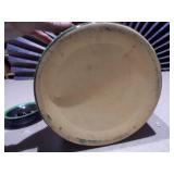 This is a vintage antique McCoy lidded crock cookie jar with a floral design.