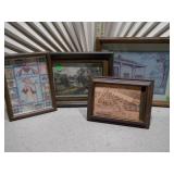 The image displays a collection of assorted framed prints and folk art paintings