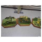 These are vintage wall plaques featuring art of antique cars