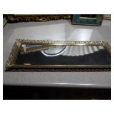 The image displays a variety of vintage or antique picture frames and mirrored trays.