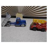 This is a collection of vintage die-cast toy cars, likely from brands such as Matchbox, Tootsietoy, or Lesney.