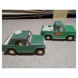 The image shows a collection of vintage die-cast toy vehicles, likely from the Tootsietoy brand