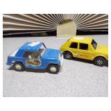 The image shows a collection of vintage die-cast toy vehicles, likely from the Tootsietoy brand