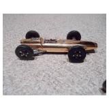 These are vintage Aurora Cigar Box die-cast Formula 1 toy cars.