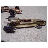 These are vintage Aurora Cigar Box die-cast Formula 1 toy cars.