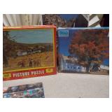 This image displays a collection of various jigsaw puzzles