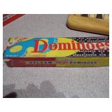 The image displays a collection of vintage board games, including a Parcheesi board and boxes, a backgammon board, and two boxes of HALSAM "Dragon Dominos