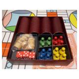 The image displays a collection of vintage board games, including a Parcheesi board and boxes, a backgammon board, and two boxes of HALSAM "Dragon Dominos