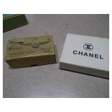 This is a collection of various vintage collectible boxes and packaging, likely for items such as soap, cigarettes, or candy.