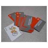 The image displays a lot of assorted sports trading cards and collectibles, primarily featuring vintage baseball cards from the late 1980s