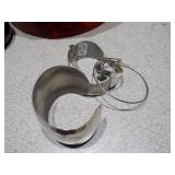 Red Plastic Bowl full of Vintage Bracelets