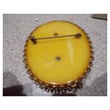 Glass Bowl full of Vintage Jewelry and Bakelite cameo pin