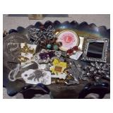 Glass Bowl full of Vintage Jewelry and Bakelite cameo pin