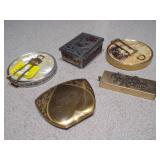 This is a collection of vintage or antique trinket, pill, or snuff boxes