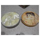 This is a collection of vintage or antique trinket, pill, or snuff boxes