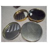 This is a collection of vintage or antique trinket, pill, or snuff boxes