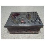 This is a collection of vintage or antique trinket, pill, or snuff boxes