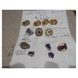 This image displays a collection of assorted vintage enamel pins