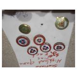 This image displays a collection of assorted vintage enamel pins