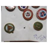 This image displays a collection of assorted vintage enamel pins