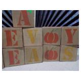 These are classic wooden alphabet blocks.