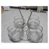 This is a vintage Mid-Century Modern (MCM) condiment caddy with four "roly poly" glasses