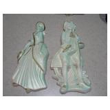 These are vintage ceramic figurines, likely French Provincial or Colonial Regency style, featuring a gentleman and a lady